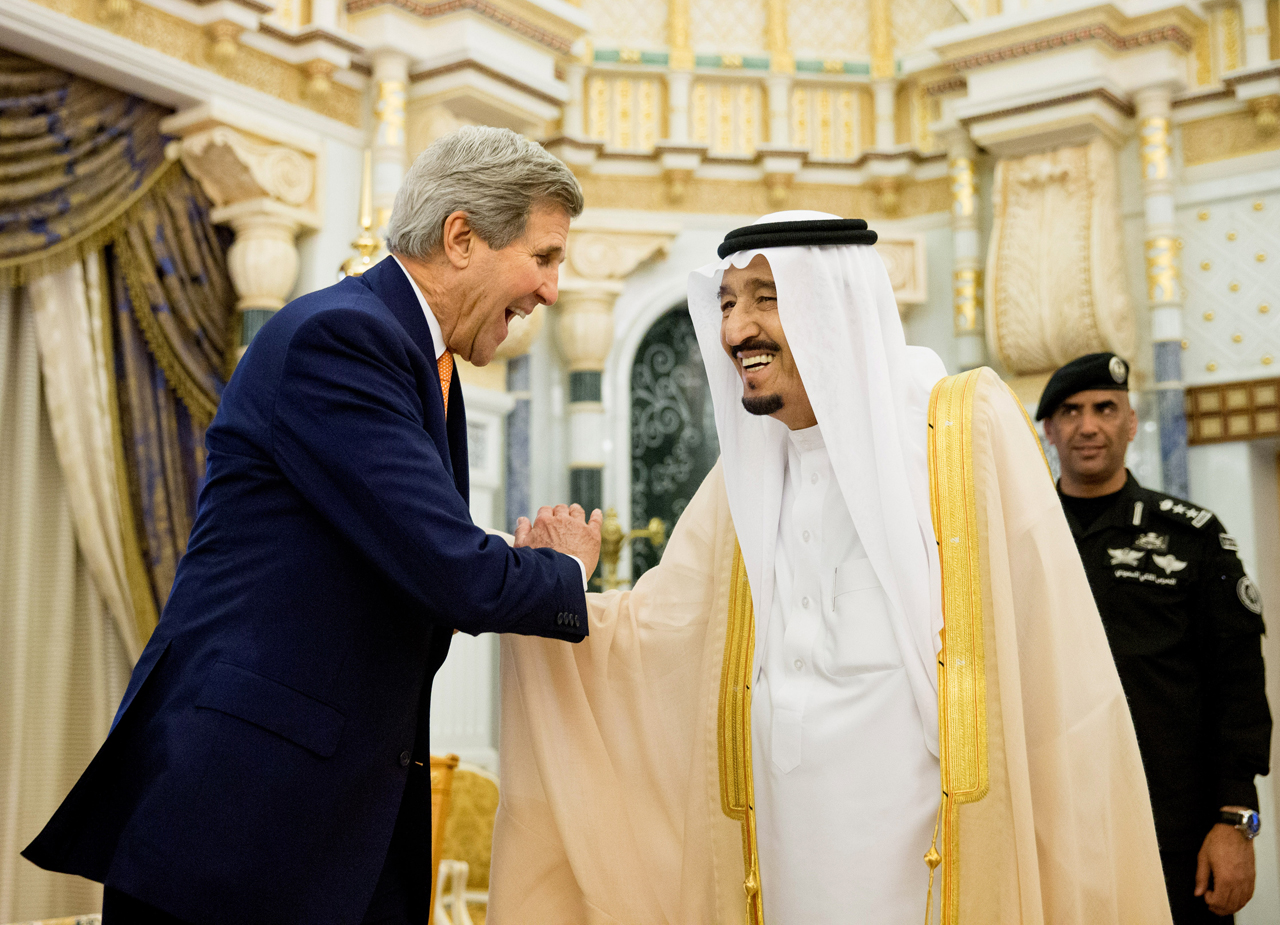 U.S. Secretary of State John Kerry, left, shakes hands with Saudi Arabia's King Salman at the Royal Court, in Riyadh, Saudi Arabia, Thursday, May 7, 2015. Kerry sought to secure a pause in Yemen's war after he arrived to Saudi Arabia to meet with the king and other top officials, citing increased shortages of food, fuel and medicine that are adding to a crisis that already has neighboring countries bracing for a mass exodus of refugees. (AP Photo/Andrew Harnik, Pool)