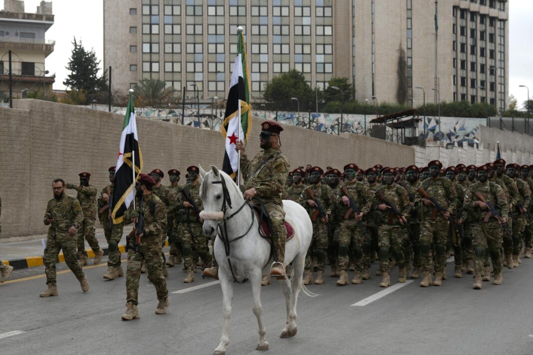 Pictures Of Hundreds Of Soldiers Escorting Named Boko Haram Sponsor Modu Sheriff In Borno – NewsRescue.com